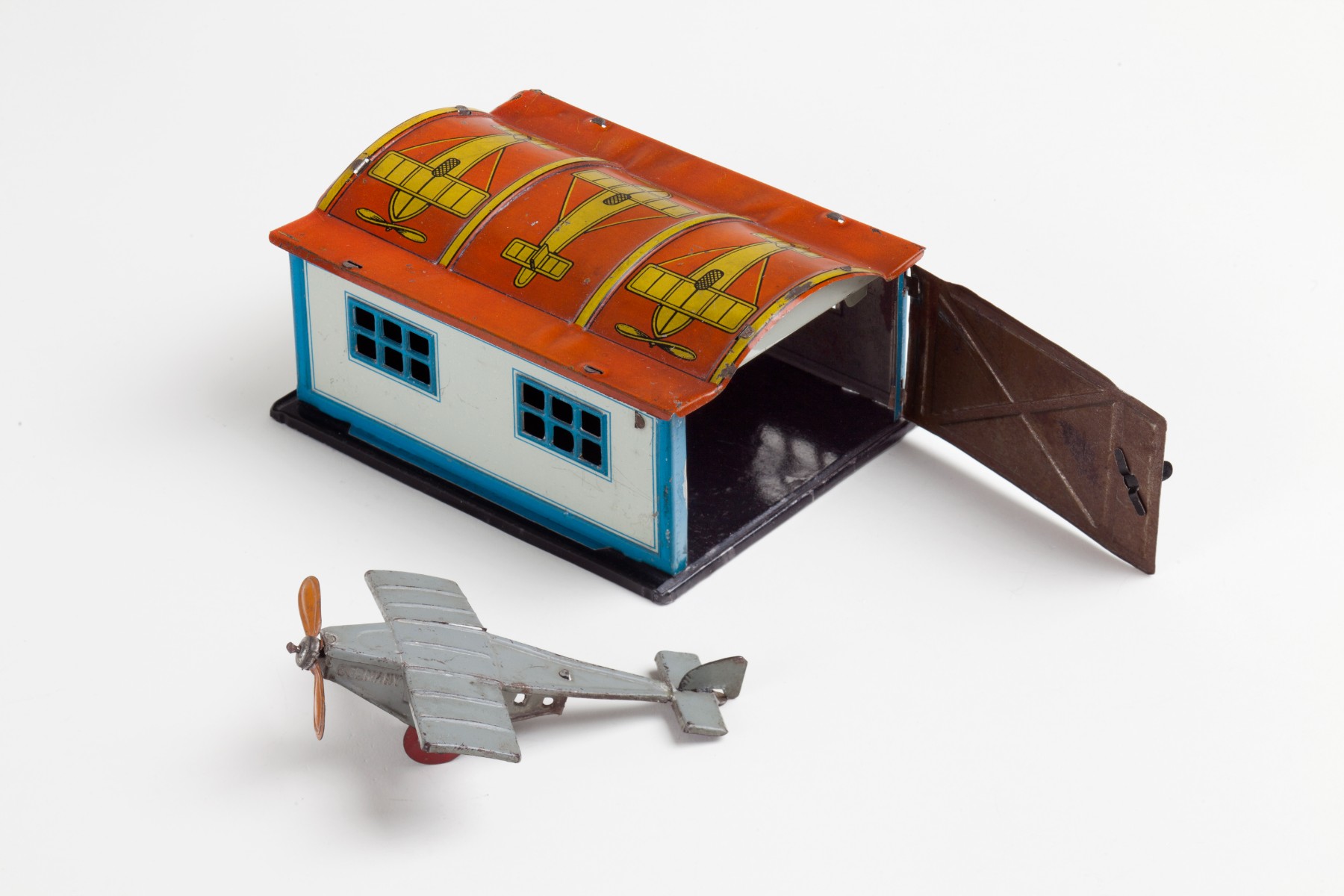Penny toy and its hangar